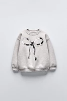 METALLIC BOW SWEATSHIRT