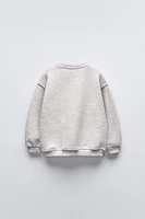 METALLIC BOW SWEATSHIRT