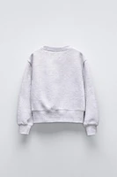 TEXT PRINT FLOCKED SWEATSHIRT