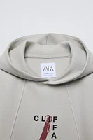 ATHLETIC SWEATSHIRT WITH ZIPPERS