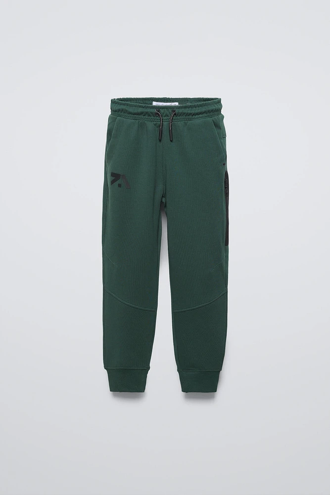 SPORTY PANTS WITH TEXTURED DETAIL