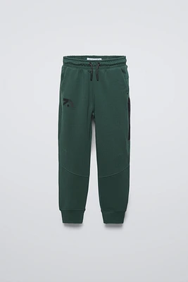 SPORTY PANTS WITH TEXTURED DETAIL