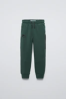 SPORTY PANTS WITH TEXTURED DETAIL