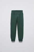 SPORTY PANTS WITH TEXTURED DETAIL