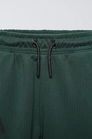 SPORTY PANTS WITH TEXTURED DETAIL