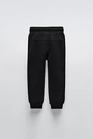 SPORTY PANTS WITH TEXTURED DETAIL