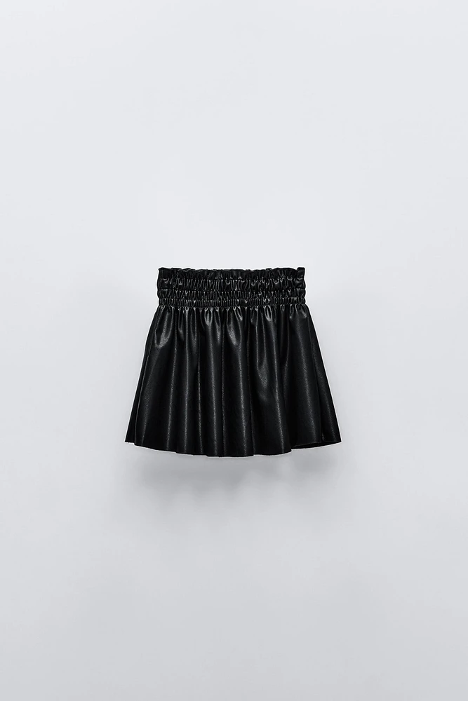 FAUX LEATHER SMOCKING SKIRT