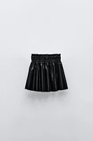 FAUX LEATHER SMOCKING SKIRT