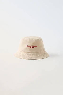 EMBROIDERED TEXT BUCKET HAT