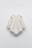 TEXTURED POLKA DOT BODYSUIT