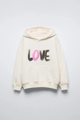 “LOVE” TEXT SWEATSHIRT