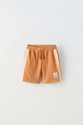 CONTRASTING LABEL TERRYCLOTH SHORTS