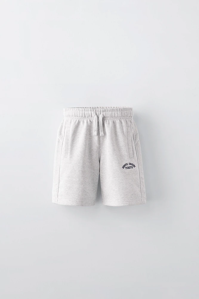 EMBROIDERED PLUSH SHORTS