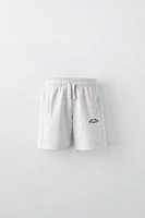 EMBROIDERED PLUSH SHORTS