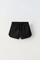 CONTRASTING RIB SHORTS