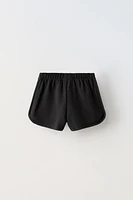 CONTRASTING RIB SHORTS