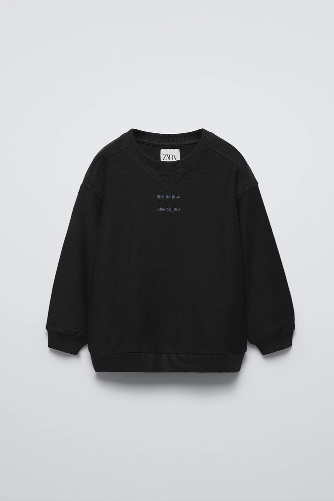 EMBROIDERED TEXT SWEATSHIRT