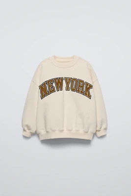 CORDUROY TEXT SWEATSHIRT