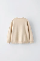 KNIT SWEATER WITH POCKET