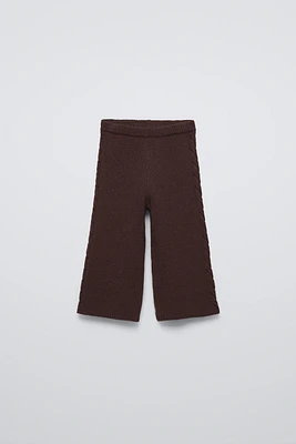 knit pants with elastic waistband. Cable sides.