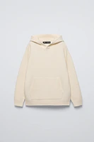 SOFT TOUCH HOODED KNIT SWEATER