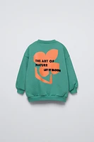 FLOCKED PRINTED SWEATSHIRT