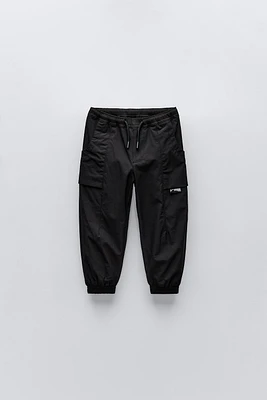 TECHNICAL FABRIC LINED PANTS WITH LABEL