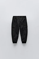 TECHNICAL FABRIC LINED PANTS WITH LABEL