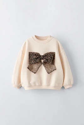 ANIMAL PRINT BOW SWEATSHIRT