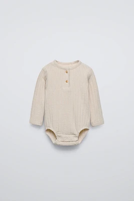 SOFT TOUCH RIBBED BODYSUIT