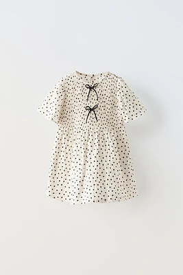 TEXTURED POLKA DOT BOW DRESS