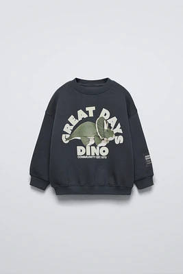 FLOCKED DINOSAUR SWEATSHIRT