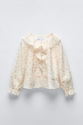 FLORAL PRINT RUFFLED BLOUSE