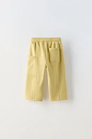 LABEL POCKET PANTS