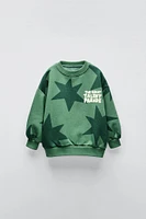 FLOCKED TEXT STAR SWEATSHIRT