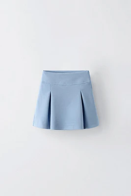 PLEATED DENIM SKORT