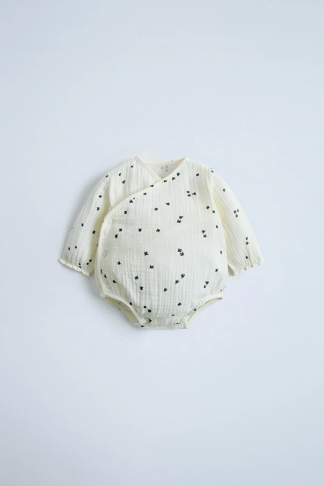 MUSLIN BIRD WRAP BODYSUIT