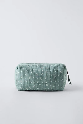 LEAF PRINT TEXTURED TOILETRY BAG