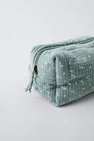 LEAF PRINT TEXTURED TOILETRY BAG