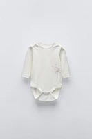 FIVE PACK OF DANDELION BODYSUITS