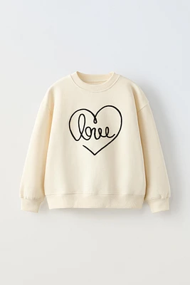 “LOVE” STRING SWEATSHIRT