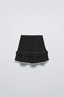 LACE TRIM RUFFLED SKORT