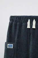 WIDE WALE CORDUROY LABEL PANTS