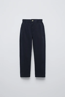 PLEATED TAPERED PANTS