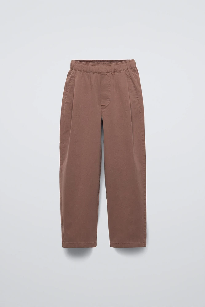 PLEATED BALLOON FIT PANTS