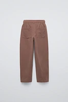 PLEATED BALLOON FIT PANTS