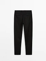 Tapered fit linen trousers