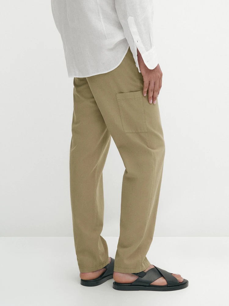 Trousers with side pocket detail