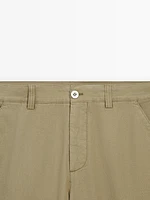 Trousers with side pocket detail