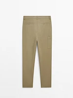 Trousers with side pocket detail